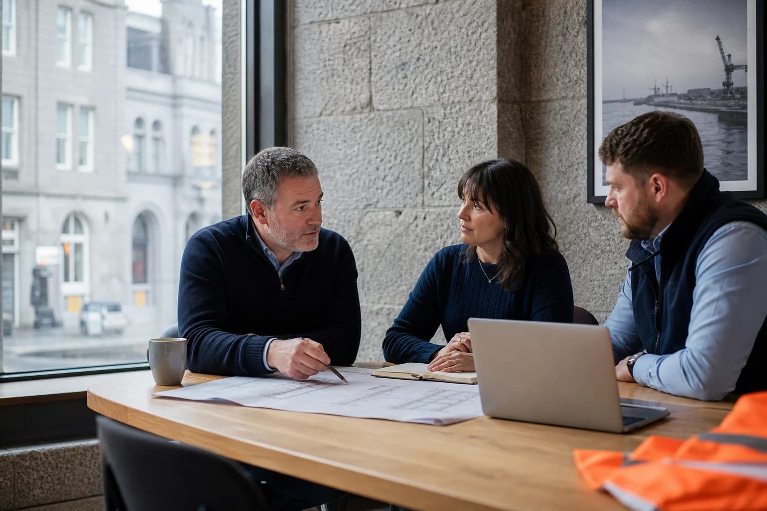 Recruitment and construction professionals discussing a project